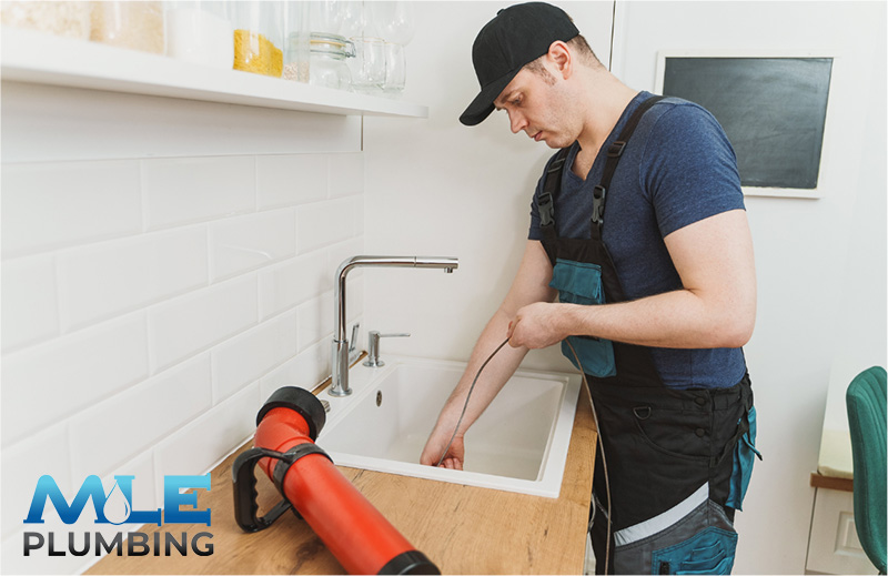 Unclogging a drain in Kansas City